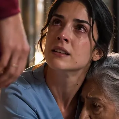 The Nurse — The young caregiver who carries Valeria's eyes