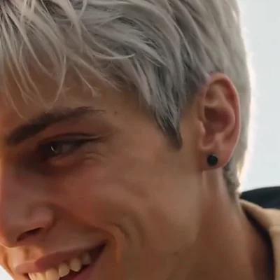 Dylan — silver hair, black earring