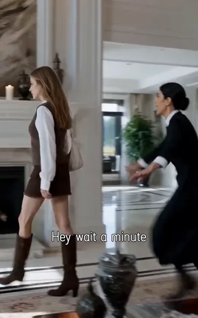 Chloe in the red dress and black mask