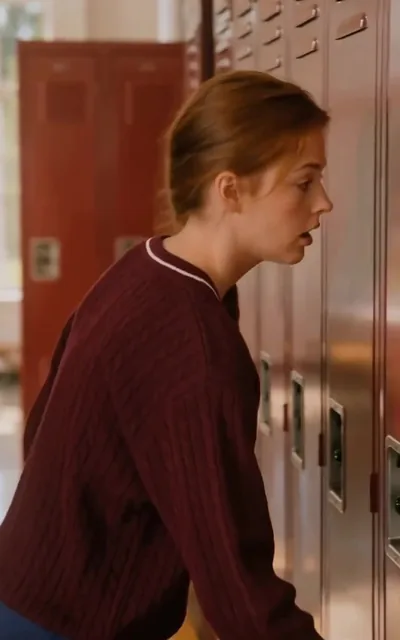 Emma at the mansion door