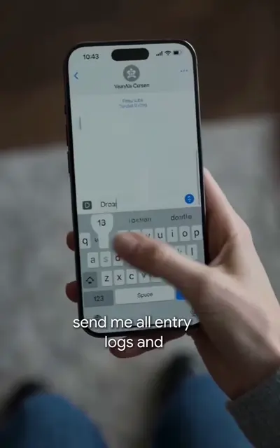 A hand holds a phone showing entry logs