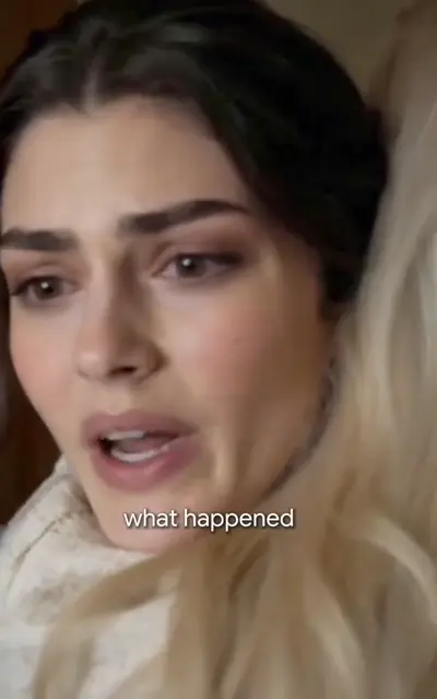 A distressed woman being told something