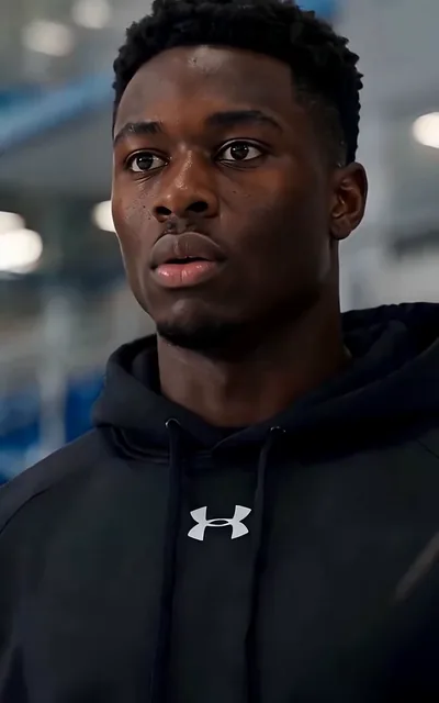 Deshawn on the bench watching