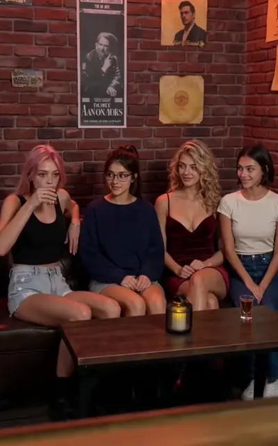 Zoe and her friends at the bar booth