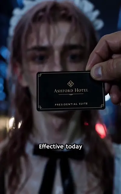 The Ashford Hotel presidential suite card held up to Eli