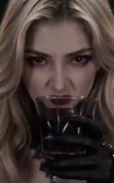 Cynthia raising the goblet in the private chamber