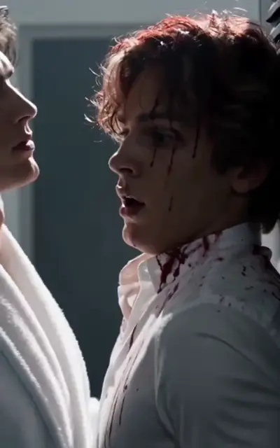 A boy with a bruised and bloody face