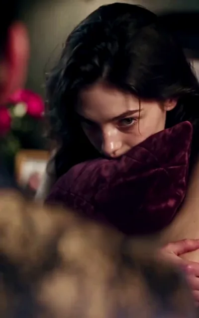 Elena watches him