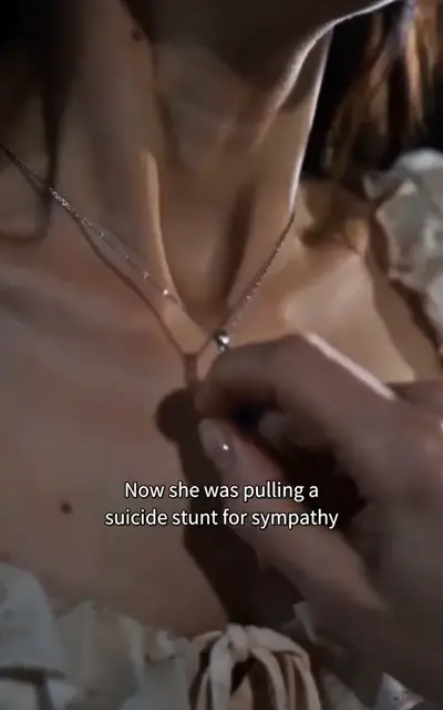 The white dress and necklace by the rail