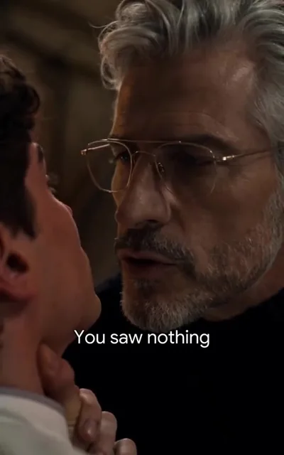 The director appearing behind him