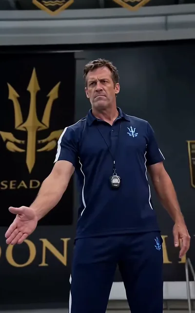 The coach blowing his whistle