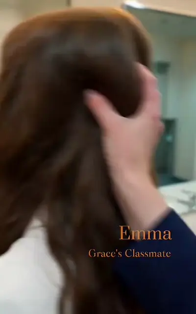 Emma confronting Grace in the school corridor