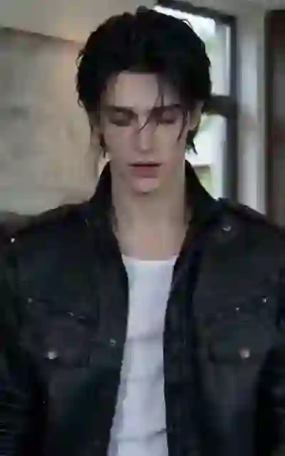 Elias in the leather jacket indoors
