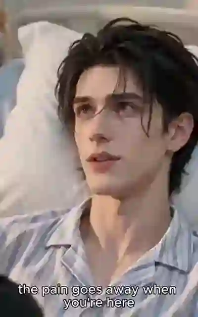 Elias in the hospital gown beside the bed
