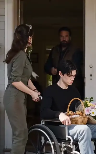 Josie at the doorway with Julian and her father