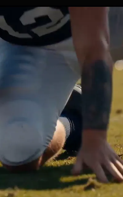 Christopher on the field in the navy number 12