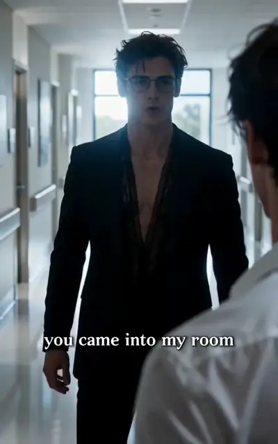 Julian in a dark dinner jacket faces Milo indoors